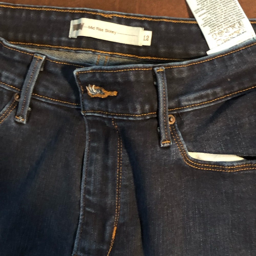 Women’s Levi’s, gently worn, size 12.